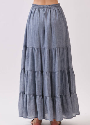 Long tiered skirt with a white background
