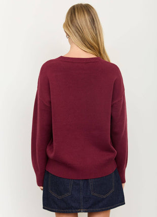 Back of burgundy sweater for woman