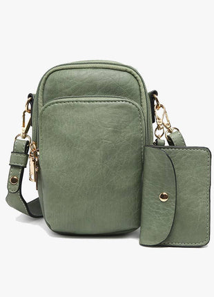 Basil crossbody bag with matching wallet on a white background