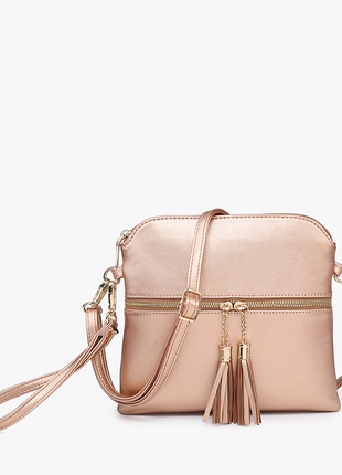 Beige handbag with a tassel on a white background