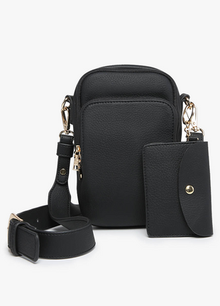 Black leather crossbody bag with attached wallet on a white background