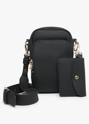 Black leather crossbody bag with attached wallet on a white background