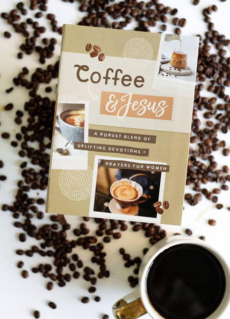 Book titled 'Coffee & Jesus' with coffee beans and a cup of coffee on a white surface.