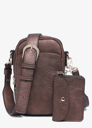 Brown leather crossbody bag with matching wallet on a white background