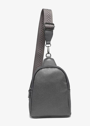 Gray textured crossbody bag with a strap on a white background