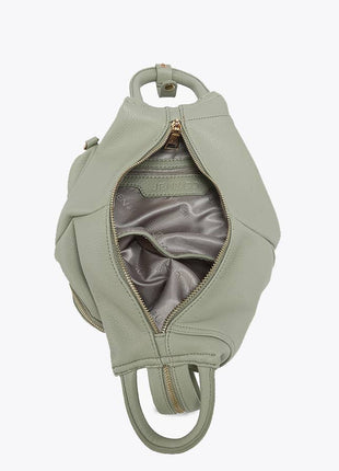 Light green handbag with a textured surface on a white background