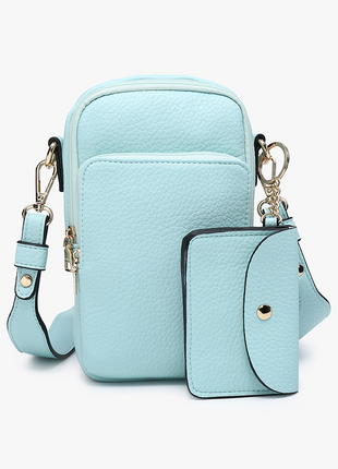 Light blue crossbody bag with a detachable pouch on a white background