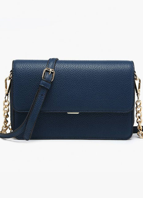Blue handbag with gold chain strap on a white background