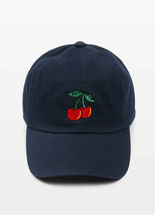 A navy blue baseball cap featuring an embroidered design of two red cherries with green leaves on the front, set against a plain white background.