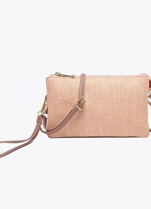 Nude woven handbag with a strap on a white background
