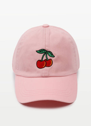 A light pink baseball cap featuring an embroidered cherry motif on the front panel, set against a clean white background.