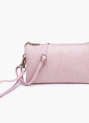 Pink textured handbag with a strap on a white background