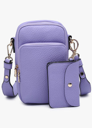 Purple crossbody bag with matching wallet on a white background