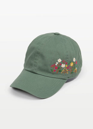 Green cap with floral embroidery on a white background