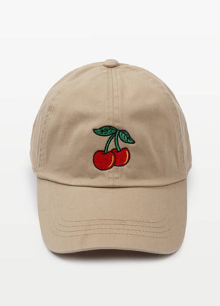 A beige baseball cap featuring an embroidered design of two red cherries with green leaves on the front, set against a plain white background.