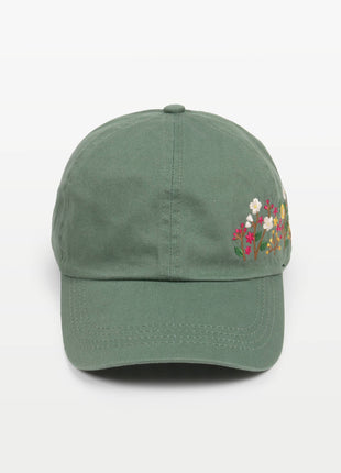 Green cap with floral embroidery on a white background